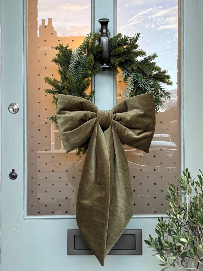 Green velvet oversized bow