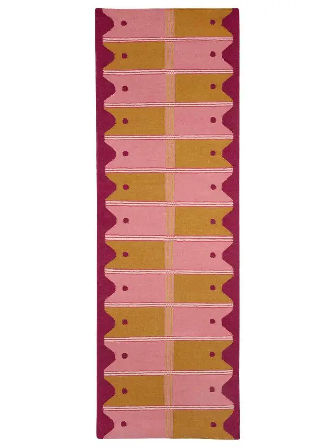 Ladder Flatweave Runner Rug, a colourful rug sitting on a white surface. 