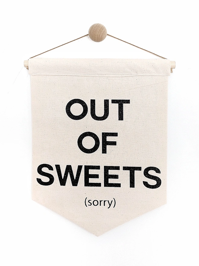 Out of sweets (sorry) printed on a fabric banner