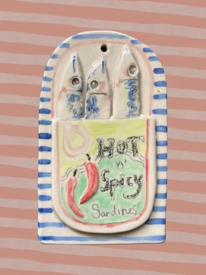 spicy sardine ceramic wall hanging