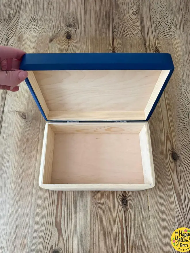 personalised hand-painted initials box. a wooden box open to show the inside.