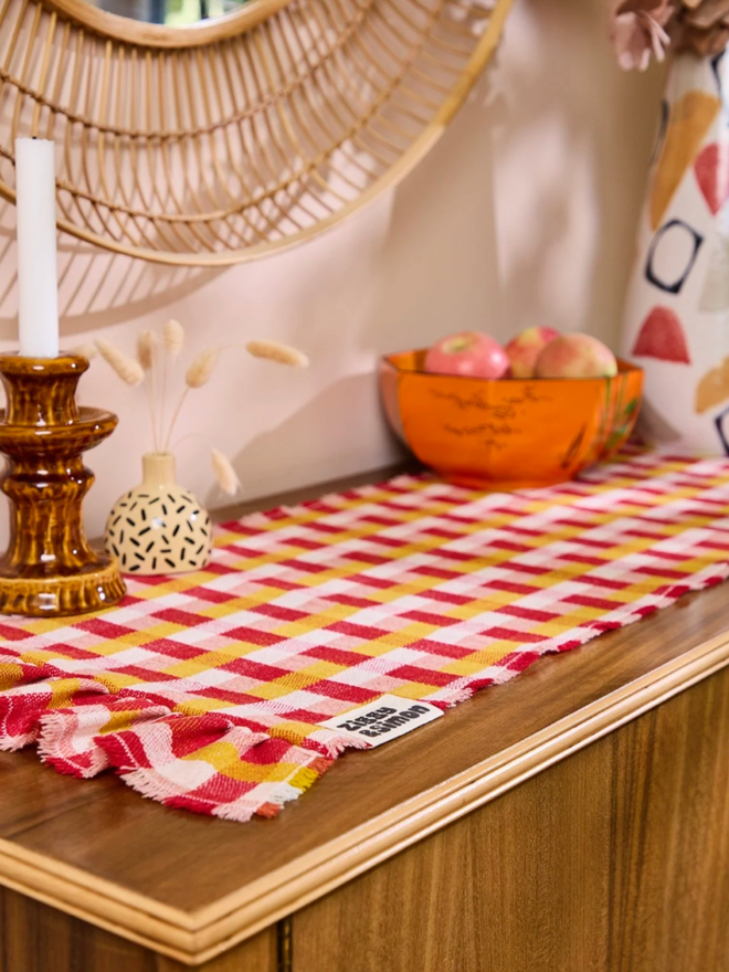 Rhubarb & Custard Runner. A runner on top of a sideboard.