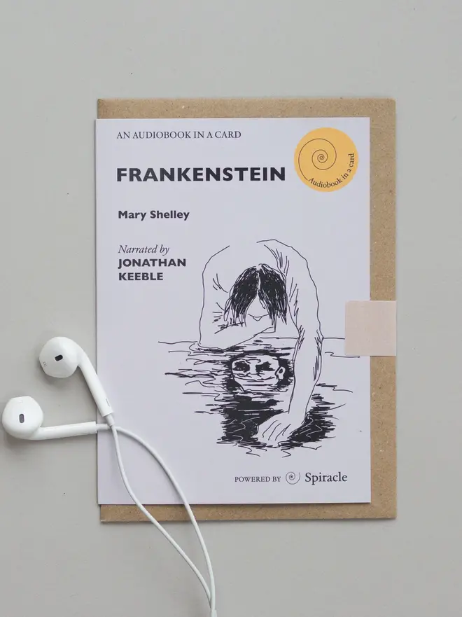 Frankenstein By Mary Shelley Audiobook In A Card, on a table. 