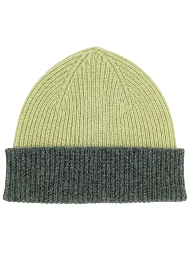 Ribbed Lambswool Unisex Beanie, a colourful ribbed beanie sitting on a white surface. 
