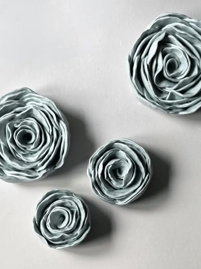 light blue glazed handmade ceramic roses