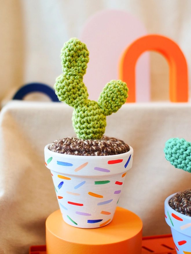 crochet cactus in hand-painted pot