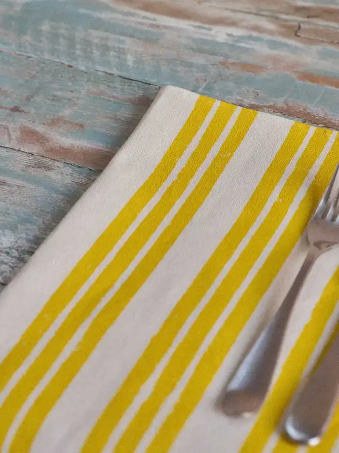 Triple yellow stripe napkin