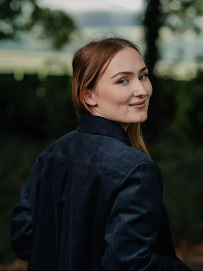 Corduroy jacket in storm blue, outdoor back view