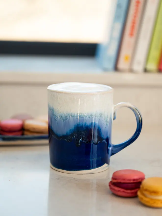 lulworth cove ceramic glazed mug, jenny hopps pottery, blue and white ceramic mug