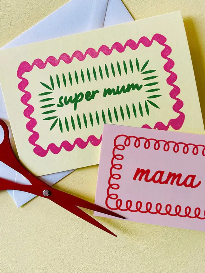 'Super Mum' hand printed card on a yellow table. 