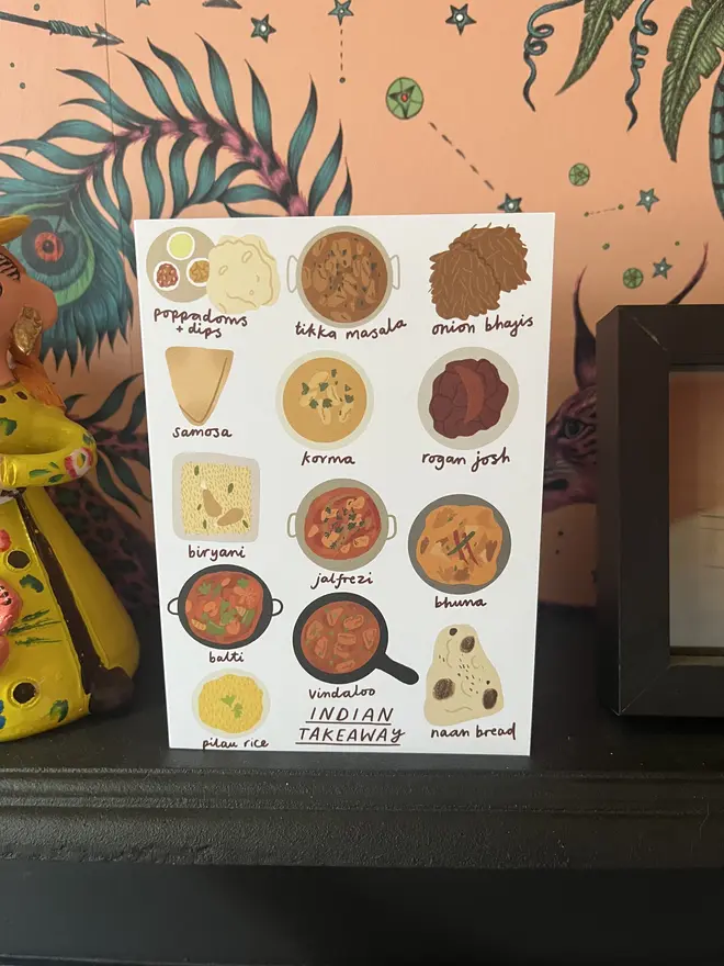 Indian takeaway card on fireplace
