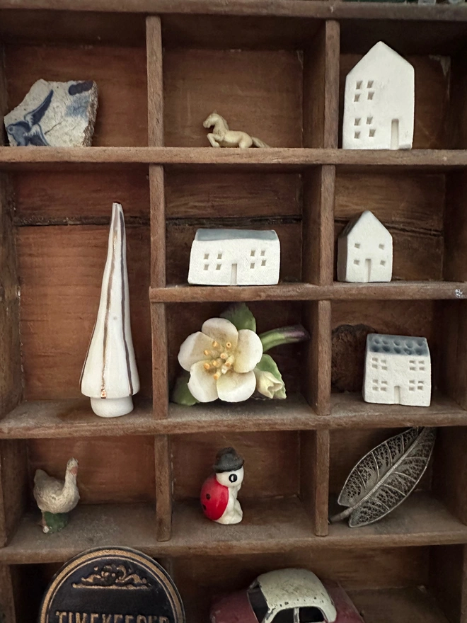 Christmas ceramic houses in printers tray
