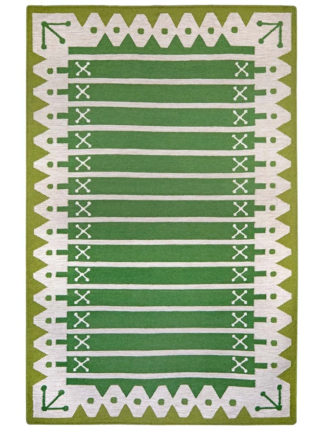 Darjeeling Flatweave Rug, a colourful rug on a plain surface. 