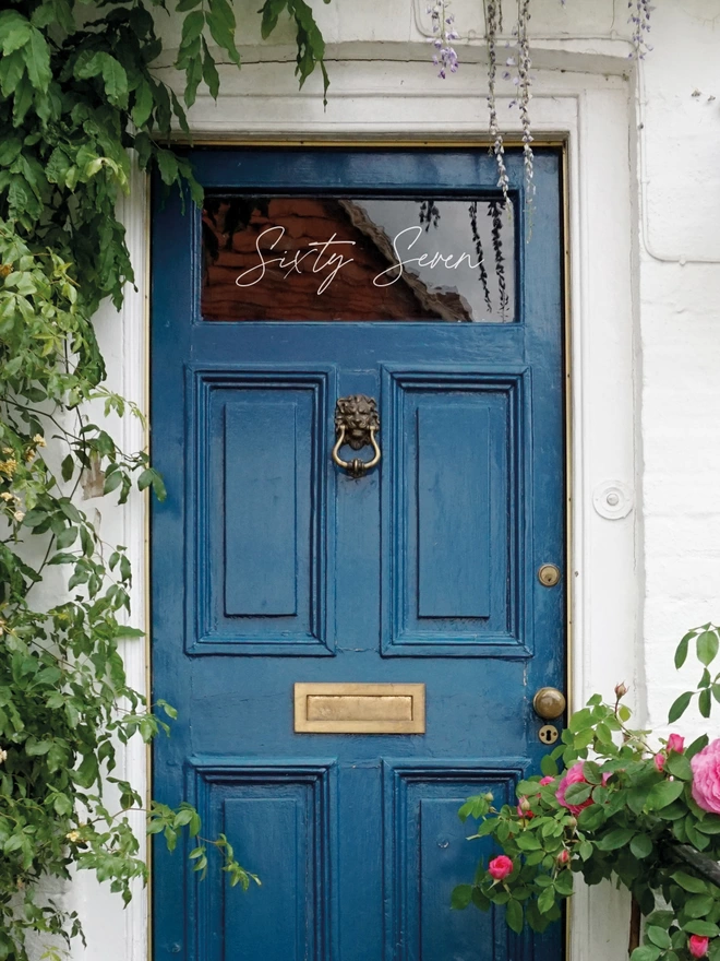 Handwritten Script, Front Door Number Sticker Decal on window above a blue front door