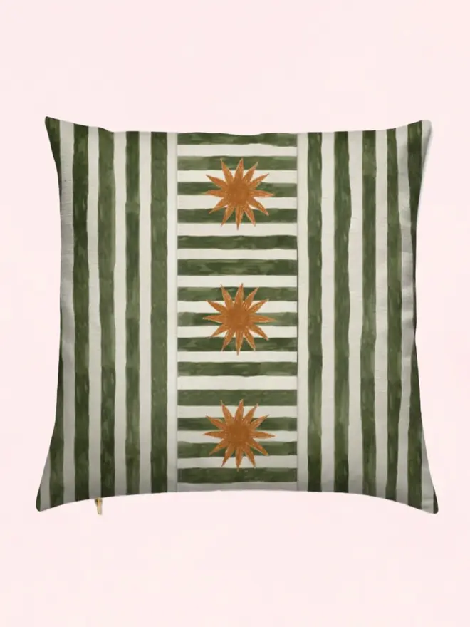 sun stripe cushion. a green and white striped cushion cover with a sun motif.