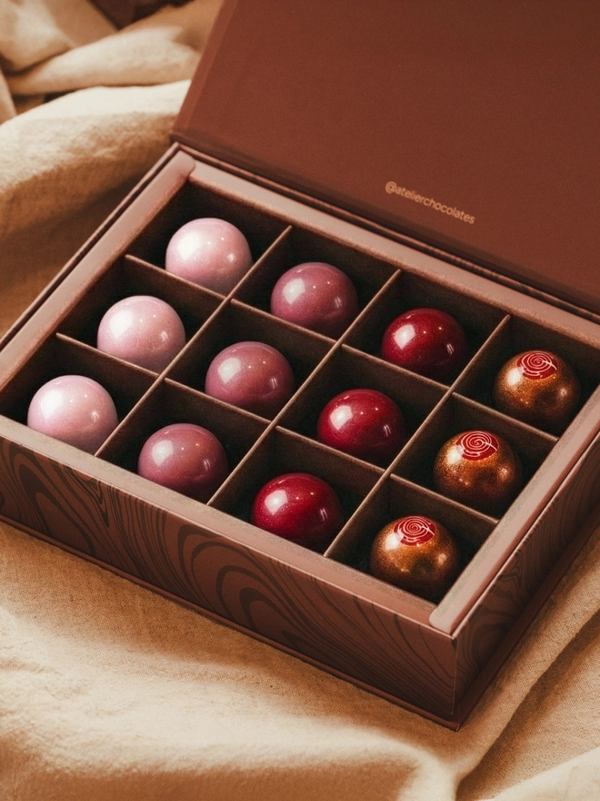An Atelier Chocolates Valentine's collection of twelve artisan bon bons.