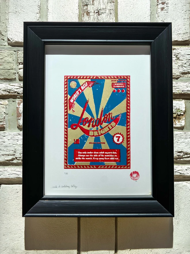 Bring a touch of nostalgic British charm to your space with this striking London Brights limited edition screen-print, inspired by the bold graphics of fireworks labels.     Featuring a vibrant palette of red, blue, and gold, the design showcases dramatic sunburst rays and retro typography, capturing the energy and character of classic mid-century advertising.      Each print includes the artist’s signature and edition number, this piece is perfect for lovers of London, vintage design, and unique statement art.