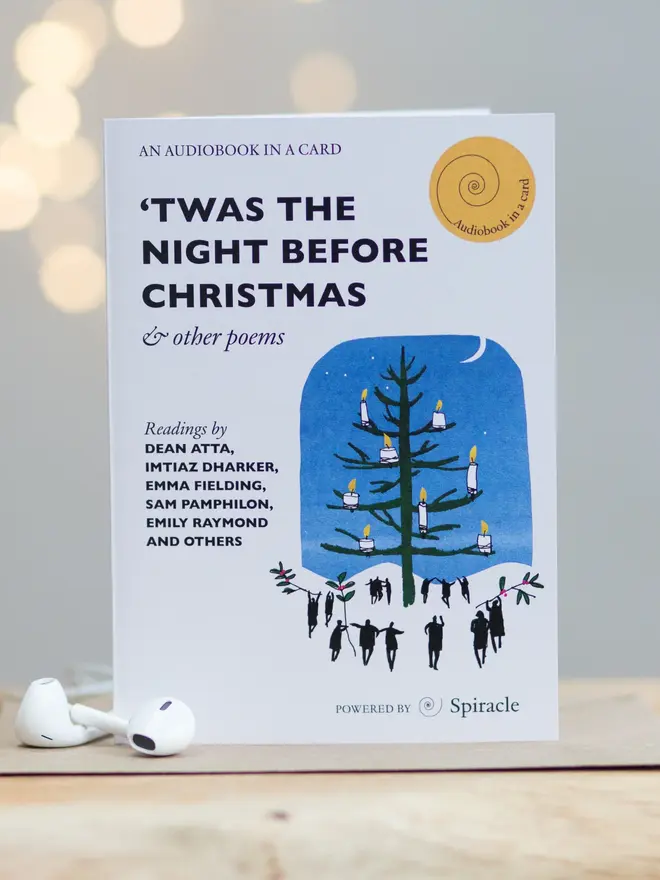'Twas the Night Before Christmas'  Audiobook Card, against a grey background, next to headphones. 