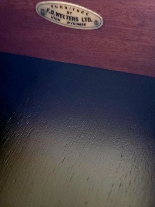 Makers mark inside teak sideboard drawer