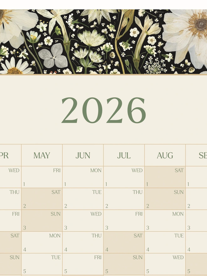 A pretty floral year wall planner. A 2026 calendar with a delightful pressed flower design created from pressed white flowers. Perfect for bringing a touch of the outdoors to any studio, home office or workspace. 