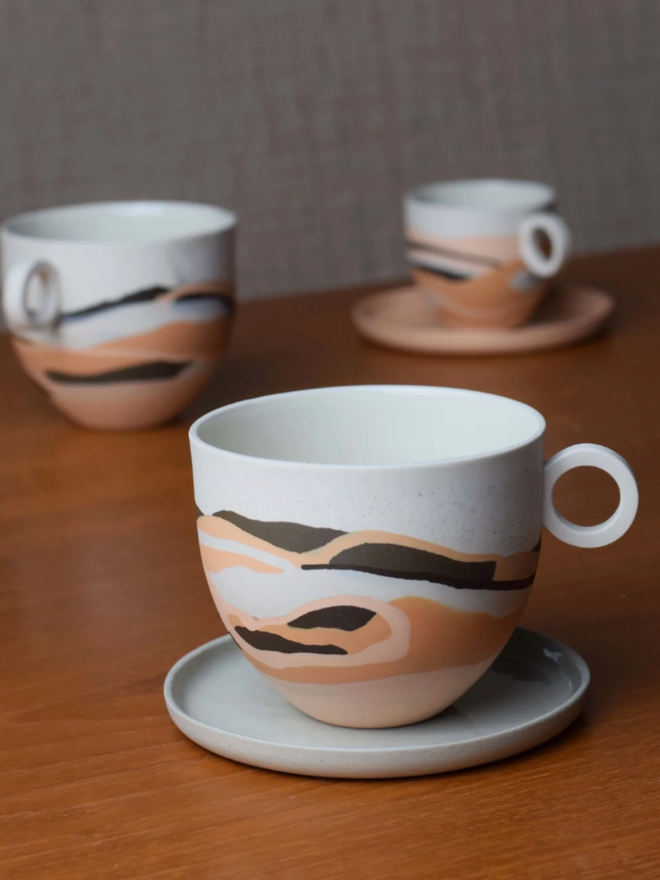 Desert Dreamlands Espresso Cup. A selection of the Desert Dreamlands collection, showing typical decoration styles.