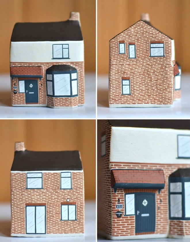 handmade ceramic sculpture in personalised design of a house