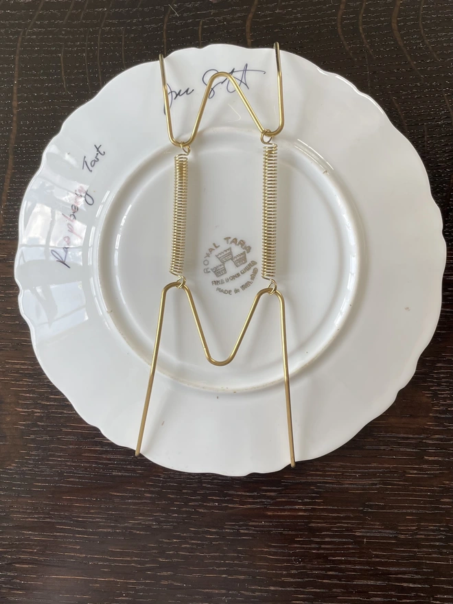 plate hanger on back of painted plate