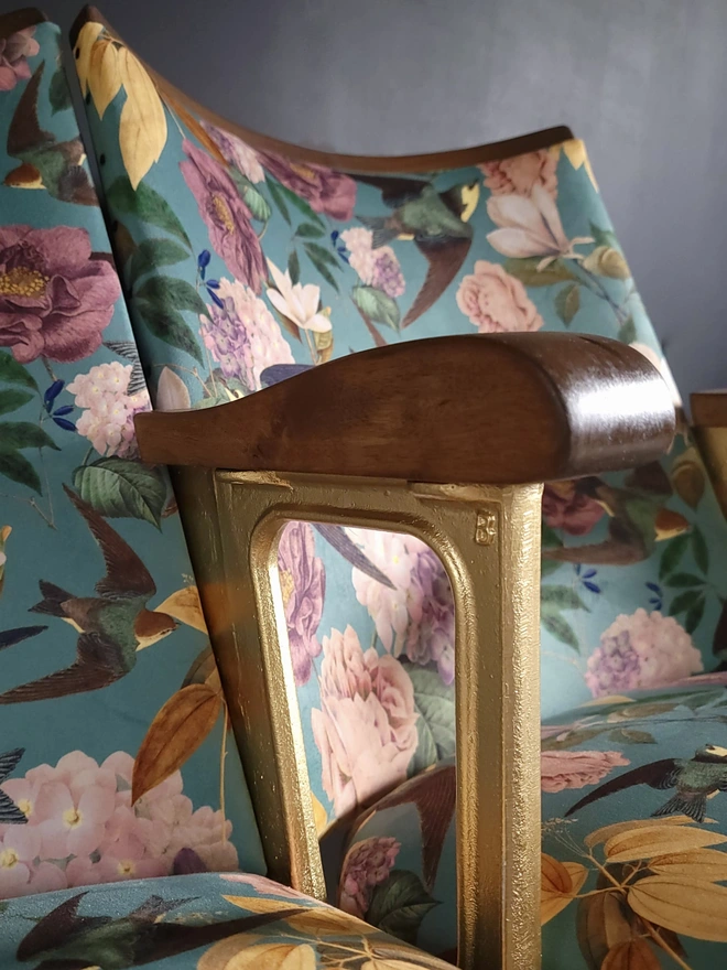 Vintage floral cinema seats with gold cast iron