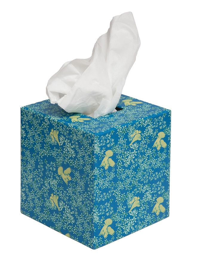 Corali Tissue Box Cover, a colourful and patterned tissue box sitting on a white surface against a plain backdrop. 