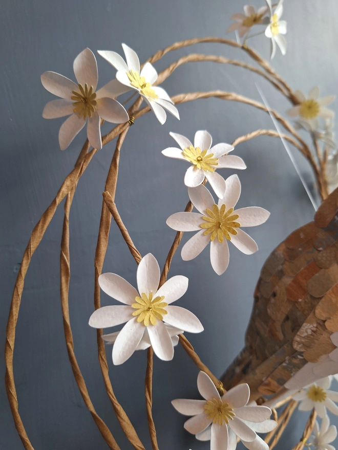 handmade white and yellow paper flower wreath detail