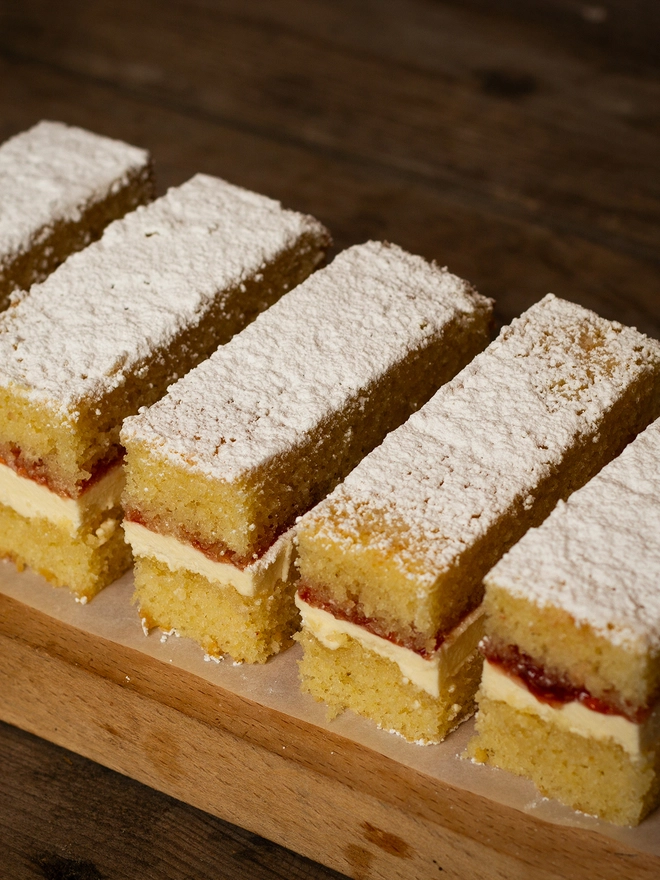Victoria Sponge Cake showing buttercream and jam sandwiched between two sponge cake