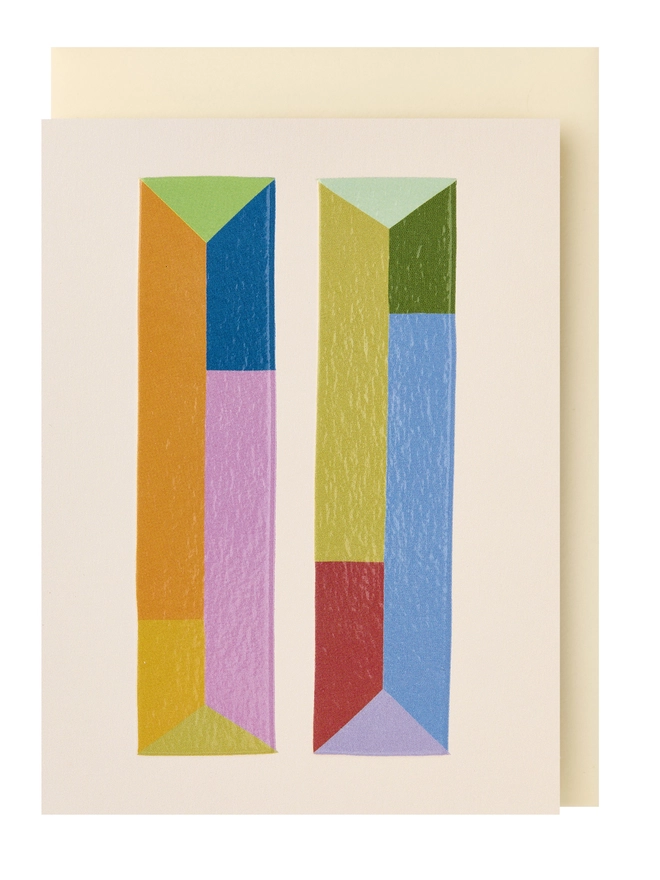 Colourful mini greeting card featuring a colour block 11 in the centre of a cream background