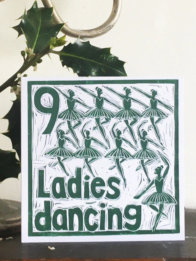 Christmas card Nine Ladies Dancing The Twelve Days of Christmas linocut design by Kate Guy