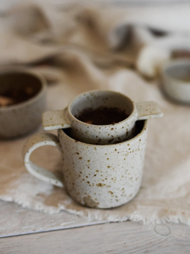 stoneware tea strainer and dish