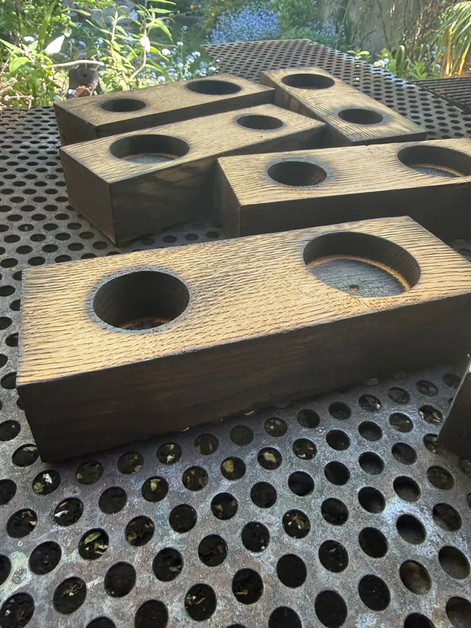 Wood holders after being charred 