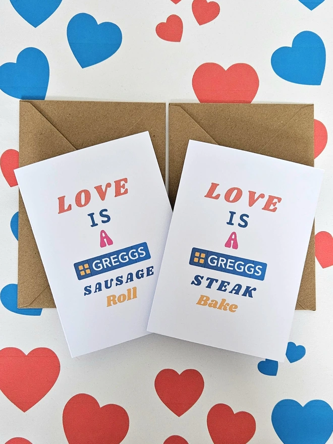 A photograph of the front of a humorous A6 greeting card illustrated using brightly coloured text. The text says love is a Greggs sausage roll or love is a Greggs steak bake