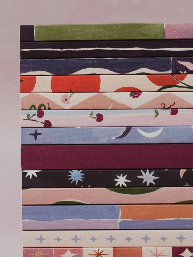 Close-up of a stack of Sister Paper Co notebooks