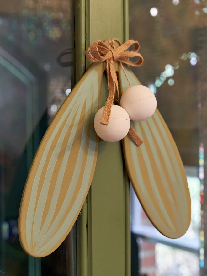 giant handpainted wooden mistletoe