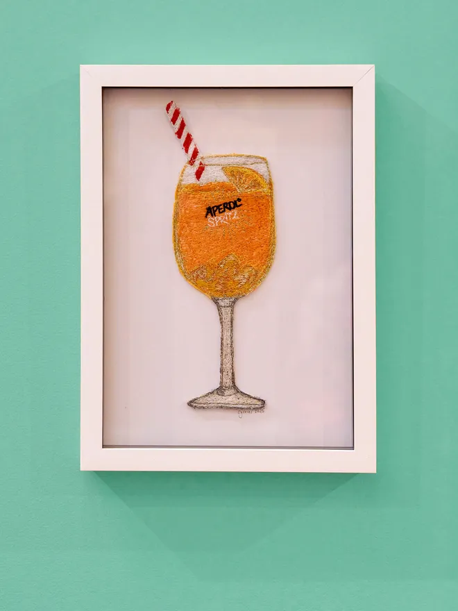 Aperol Spritz Embroidery Wall Art On Teal Background