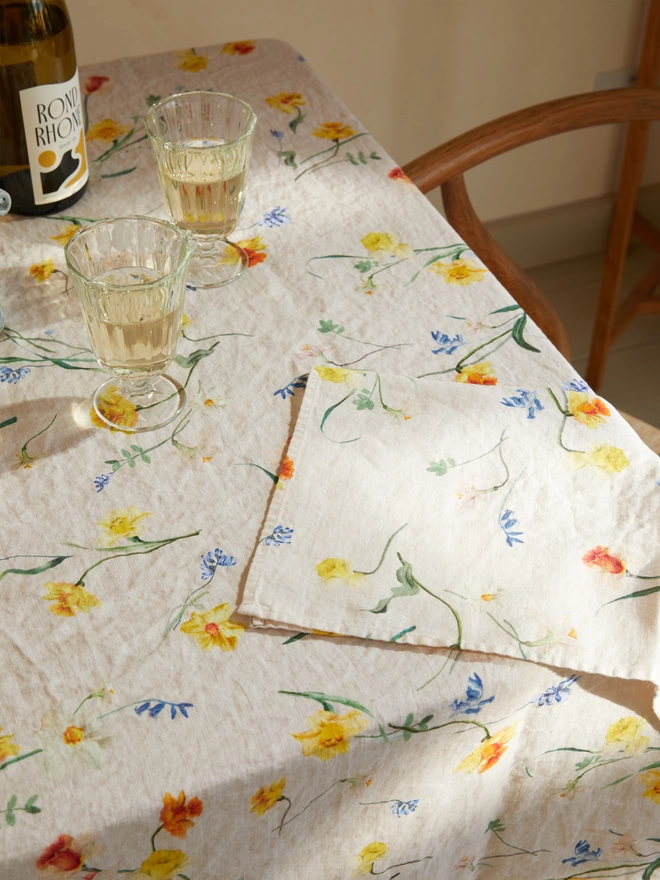 Table with linens printed with daffodils