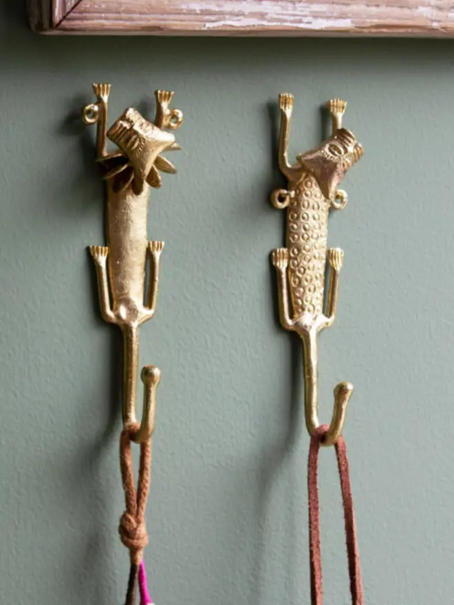 brass leopard and lion hook on wall