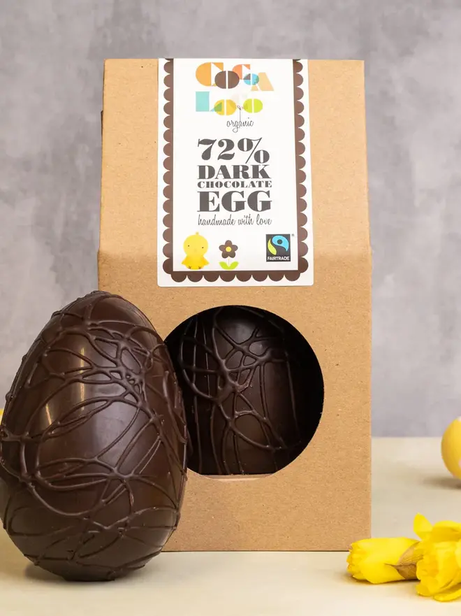 Dark Chocolate Easter Egg on a table with a brown box