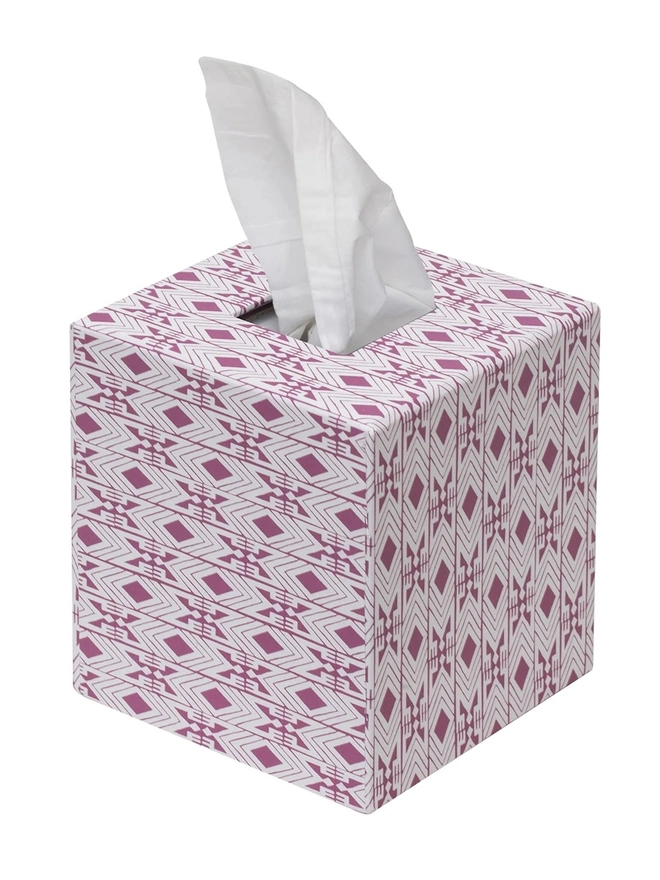 Tijan Tissue Box Cover, a colourful and patterned tissue box sitting on a white surface against a plain backdrop. 