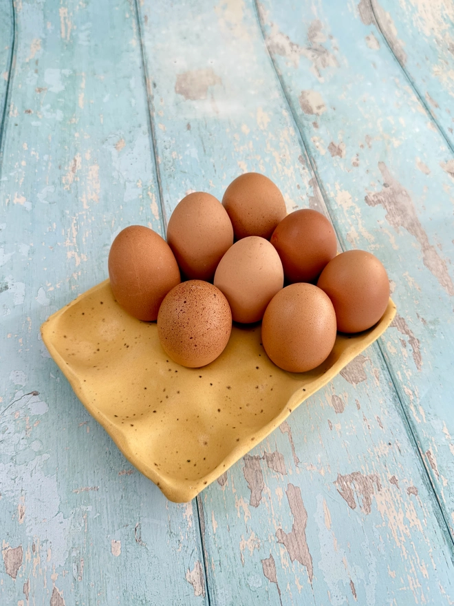 Yellow speckled egg tray kitchen storage