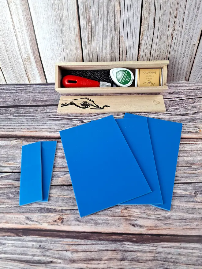 Wooden box carving kit with contents and A6 blue lino