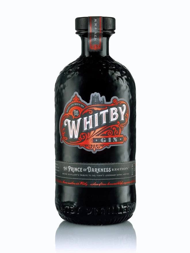 Prince Of Darkness Gin, a bottle of gin sitting on a plain white surface. 