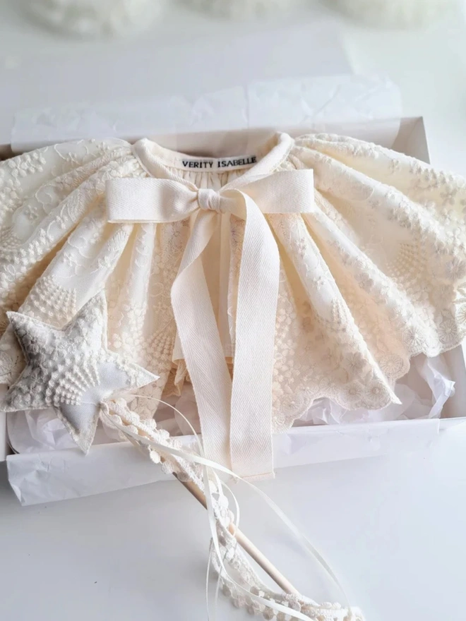 Lucine Lace Cape & Wand Collection  in a cardboard box