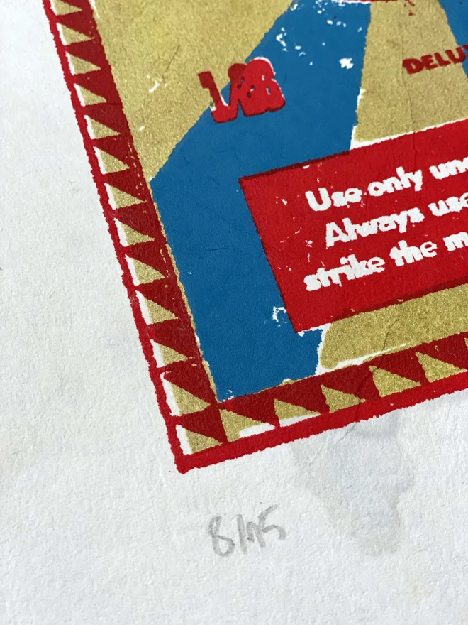 Bring a touch of nostalgic British charm to your space with this striking London Brights limited edition screen-print, inspired by the bold graphics of fireworks labels.     Featuring a vibrant palette of red, blue, and gold, the design showcases dramatic sunburst rays and retro typography, capturing the energy and character of classic mid-century advertising.      Each print includes the artist’s signature and edition number, this piece is perfect for lovers of London, vintage design, and unique statement art.