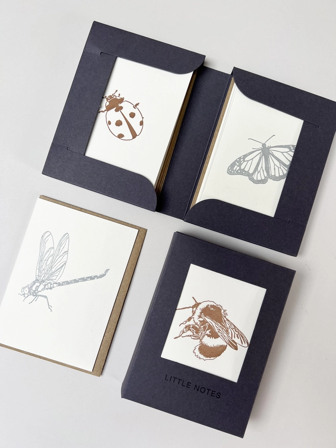 Open and closed metallic insects gift boxes for little notes allowing you to see three of the four designs in one box