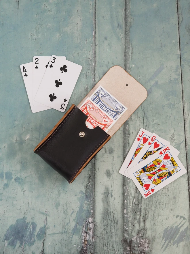 Personalised Leather Double Deck Playing Card Holder. Hand dyed dark brown case with two packs of playing cards.